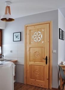 Kuchyňa alebo kuchynka v ubytovaní Apartamenty JSZI
