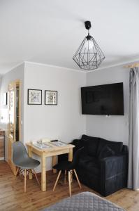 Posedenie v ubytovaní Apartamenty JSZI