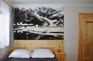 Posteľ alebo postele v izbe v ubytovaní Apartamenty JSZI