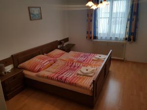 Postel nebo postele na pokoji v ubytování Haus Schattau
