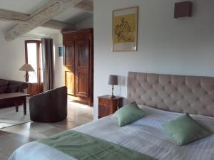 Postel nebo postele na pokoji v ubytování La Bastide de l'Oliveraie + 31 fotografií