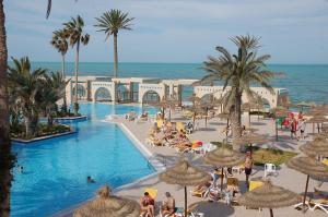 a resort with a swimming pool and the ocean at Zita Beach Resort in Zarzis