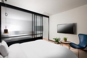 Voodi või voodid majutusasutuse N Bridge Hotel JEON JU toas