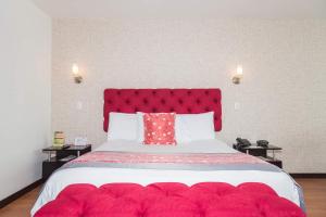 Ένα ή περισσότερα κρεβάτια σε δωμάτιο στο Hotel Varuna