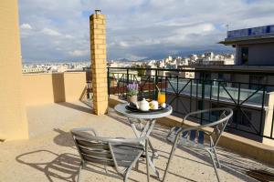 Balkón nebo terasa v ubytování Eva Hotel Piraeus