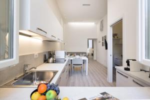 Kuchyňa alebo kuchynka v ubytovaní Duomo apartment
