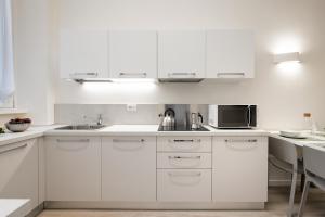 Kuchyňa alebo kuchynka v ubytovaní Duomo apartment