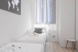 Posteľ alebo postele v izbe v ubytovaní Duomo apartment