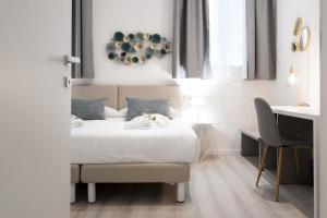 Posteľ alebo postele v izbe v ubytovaní Duomo apartment