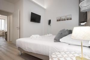 Posteľ alebo postele v izbe v ubytovaní Duomo apartment