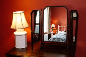 Uma cama ou camas num quarto em Elizabeth Fort