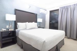 Voodi või voodid majutusasutuse Hotel Ha toas