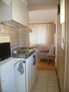 Kuchyň nebo kuchyňský kout v ubytování Ferienhaus II Heyder