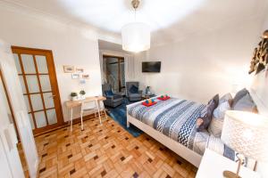 a bedroom with a bed and a living room at Je T'aime Matosinhos Beach in Matosinhos +51 photos