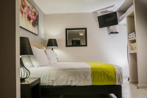 Katil atau katil-katil dalam bilik di HOTEL CAREYES