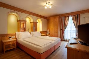 TV o dispositivi per l'intrattenimento presso Active Hotel Monte Giner