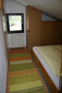 Łóżko lub łóżka w pokoju w obiekcie Apartment Waldhaus Opitz
