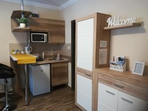 Kuchyňa alebo kuchynka v ubytovaní Silver Apartman
