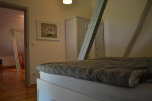 Postel nebo postele na pokoji v ubytování Apartments Golden Tüffel