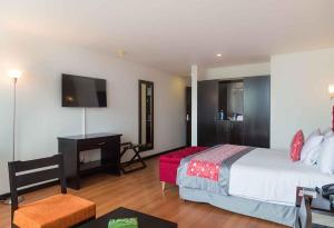 Ένα ή περισσότερα κρεβάτια σε δωμάτιο στο Hotel Varuna
