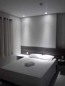 Postel nebo postele na pokoji v ubytování Lirius Hotel