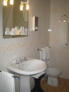 a bathroom with a sink and a toilet at Plage des Pins in Argelès-sur-Mer