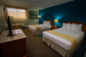Ein Bett oder Betten in einem Zimmer der Unterkunft Caribe Hotel Ponce