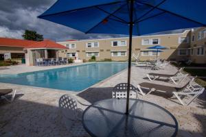 Der Swimmingpool an oder in der Nähe von Caribe Hotel Ponce