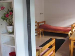 Postel nebo postele na pokoji v ubytování Håverud Hostel