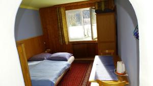 Postel nebo postele na pokoji v ubytování Ferienhaus-Römerthurm + 37 fotografií