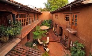 an overhead view of a courtyard in an old building at Hotel Casa Encantada in Pátzcuaro
