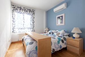 A bed or beds in a room at Ribera