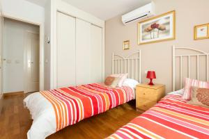 A bed or beds in a room at Ribera