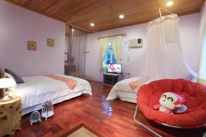 Katil atau katil-katil dalam bilik di Zhen Shan Zhuang B&B