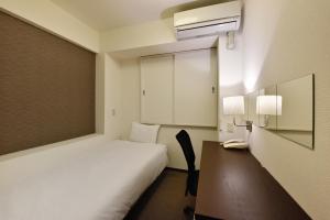 Postel nebo postele na pokoji v ubytování Hotel Kansai + 26 fotografií