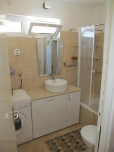 Kúpeľňa v ubytovaní Sinistaj Rooms