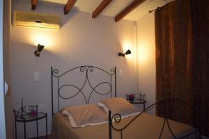 Postel nebo postele na pokoji v ubytování Zandoli + 14 fotografií