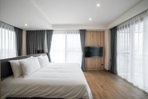 Postel nebo postele na pokoji v ubytování Grange Inn
