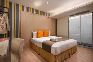 Postel nebo postele na pokoji v ubytování Click Hotel - Taipei Main Station Branch