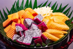a bowl filled with different types of crackers and vegetables at Viangluang Resort in Chiang Mai