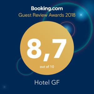 a sign that reads guest review awards with a circle at Hotel GF in Cesano Boscone