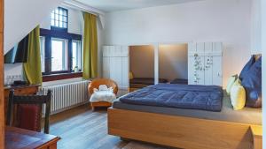 Postel nebo postele na pokoji v ubytování Altes Amtsgericht Oppenheim