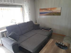 Posezení v ubytování FeWo zwischen den Deichen