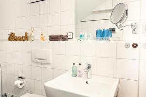 Ванная комната в Turm-Appartement Strandburg