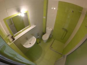 Koupelna v ubytování Riviera Rooms