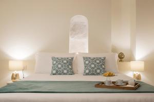 Postel nebo postele na pokoji v ubytování La Ripa Boutique Hotel