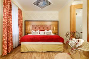 Postel nebo postele na pokoji v ubytování Hotel Schlosskrone