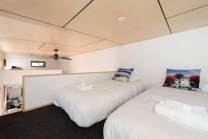 Krevet ili kreveti u jedinici u okviru objekta Cozy Tiny House Hideaway