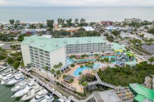 an aerial view of a resort with a marina at Harbourside at Marker Condos in Clearwater Beach