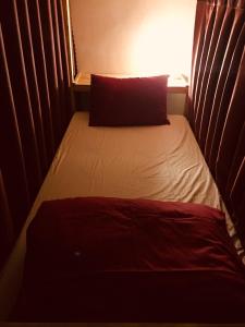 Postel nebo postele na pokoji v ubytování Starhill Hotel